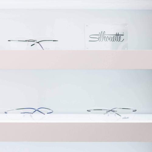 Quadro wall acrylic shelves with white LED lighting.